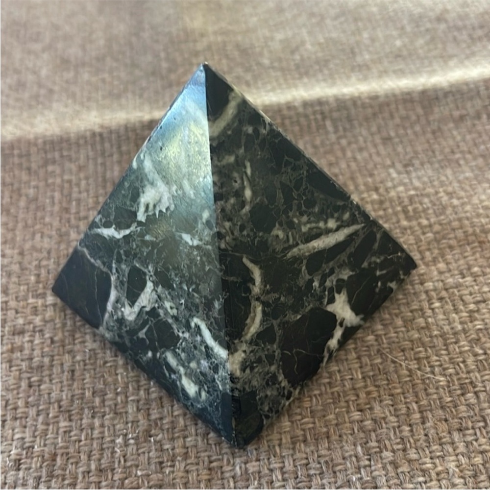 Black and white stone pyramid approximately 3” x 3”